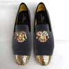 Elegant navy velvet loafers with plush lining and gold toe.