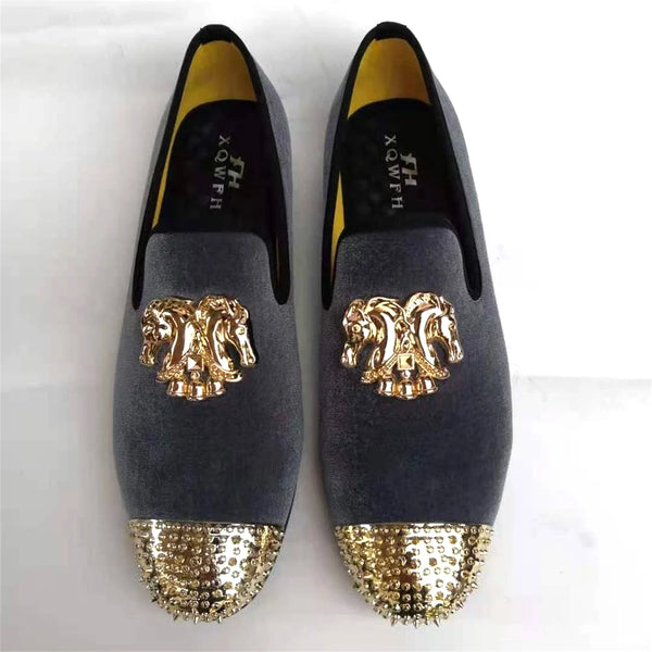 Elegant navy velvet loafers with plush lining and gold toe.