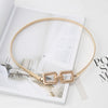 Chic elastic skinny waist belt for women, perfect for dresses and tunics, combining style and comfort with a sleek metal desi