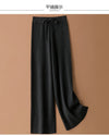 Luxe cashmere blend wide-leg pants for women, featuring a high waist, soft fabric, and comfortable elastic waistband.