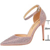 Pair of silver rhinestone pumps with super-high thin heels for special occasions
