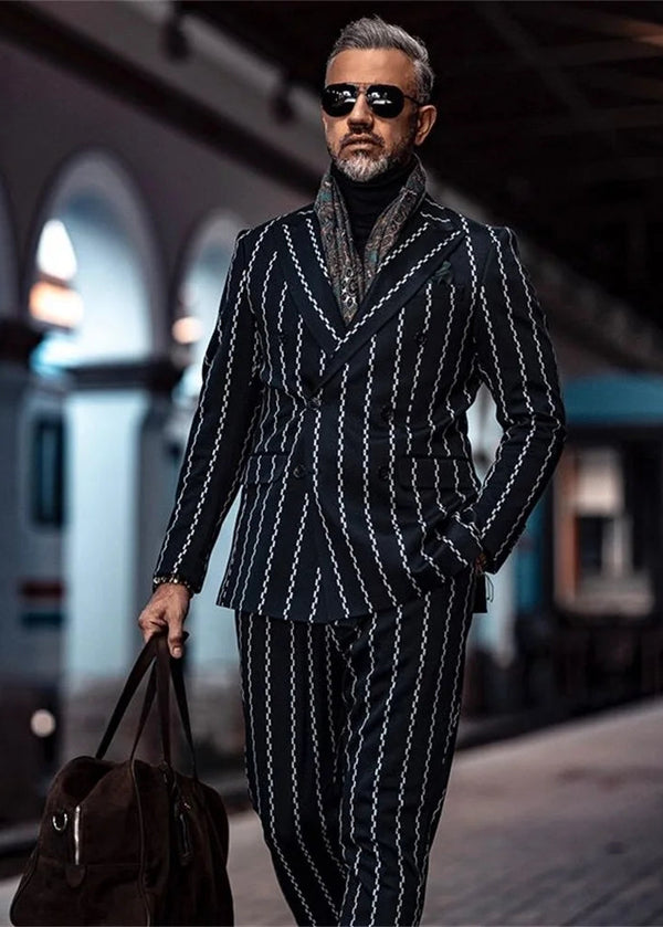 Elegant striped men's wedding suit in navy, featuring a peaked lapel and slim fit design.