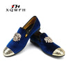 Elegant gold toe velvet loafers for men in rich navy blue.
