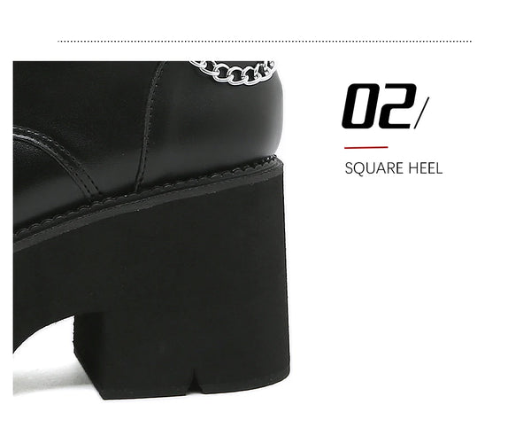 Gothic ankle boots featuring chunky platform sole and metal chain accent