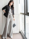 Luxe cashmere blend wide-leg pants for women, featuring a high waist, soft fabric, and comfortable elastic waistband.