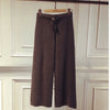 Luxe cashmere blend wide-leg pants for women, featuring a high waist, soft fabric, and comfortable elastic waistband.