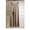 Luxe cashmere blend wide-leg pants for women, featuring a high waist, soft fabric, and comfortable elastic waistband.