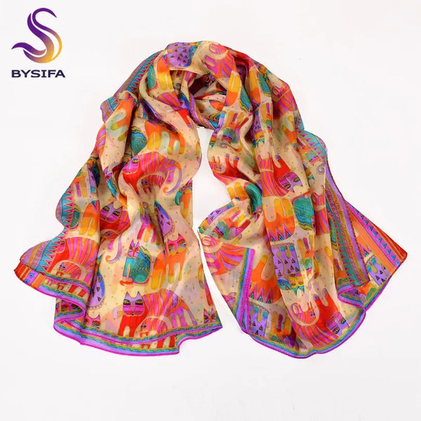 Close-up of the vibrant blue and coffee colors in Autumn Whisper silk scarf.