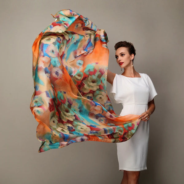Autumn Whisper silk scarf in blue and coffee hues, showcasing elegant draping.