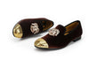 Plush velvet loafers with gold toe, ideal for evening wear.