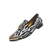 Luxury men's loafers featuring a breathable lining and gold accents.