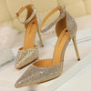 Rhinestone stiletto pumps with 10cm heels and crystal embellishments on white background