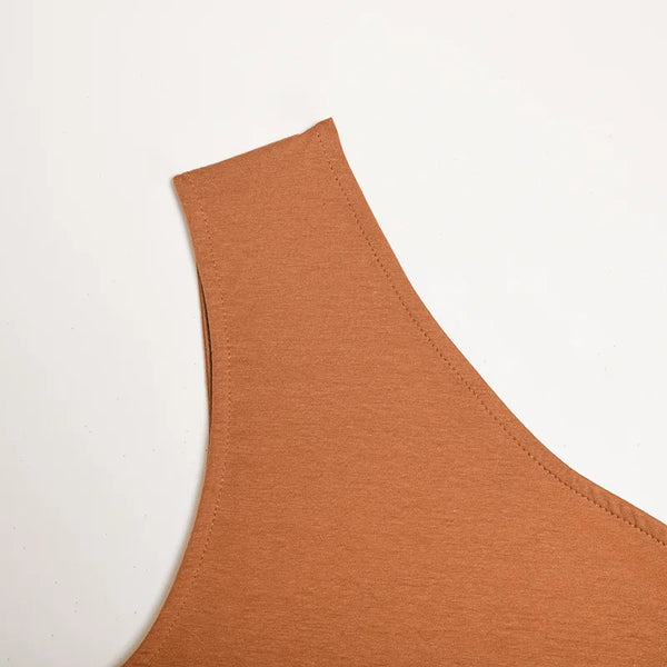 Breathable crop tank with unique irregular hemline and backless cut