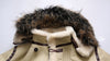 Luxury men's shearling leather bomber jacket with a casual outfit.
