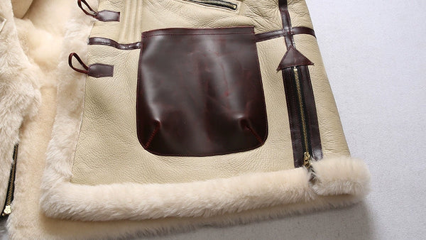 Luxury men's shearling leather bomber jacket in a stylish urban setting.