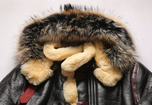 Luxury men's shearling leather bomber jacket in a snowy landscape.