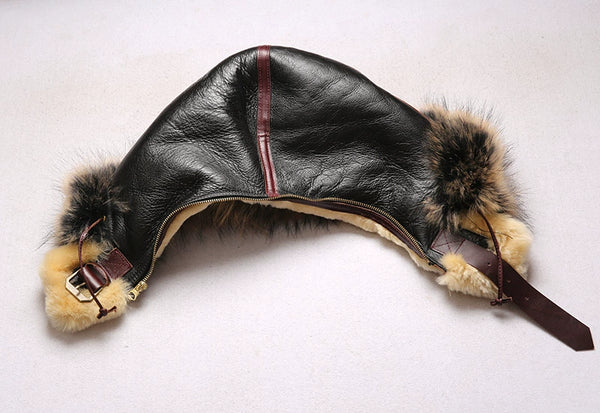 Luxury men's shearling leather bomber jacket with a stylish belt.