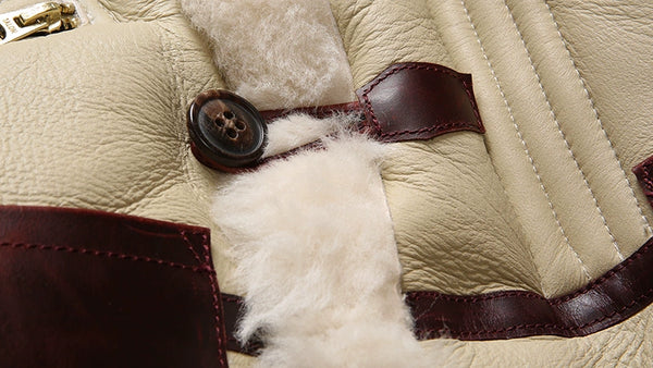 Model showcasing the warmth of the luxury men's shearling leather bomber jacket.