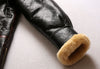 Detail of the bomber jacket's elegant turn-down collar.