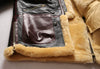 Detail of the bomber jacket's practical design elements.