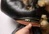Luxury men's shearling leather bomber jacket with a classic bomber style.