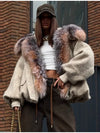 Side view of relaxed fit plush hooded jacket with cotton padding
