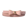 Elegant women's belt with bow detail in faux leather, perfect for casual and formal outfits, featuring a sleek metal buckle.