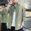 Stylish Harajuku-Inspired Men's Casual Shirt in solid color, lightweight polyester, perfect for urban street fashion.
