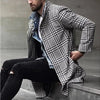 Chic plaid men's trench coat with single-breasted closure, perfect for cold weather and stylish daily wear. Available in size