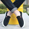 Men's casual footwear with moisture-wicking canvas and massage insole features