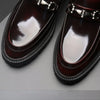 Side view of black Oxfords with a focus on craftsmanship.