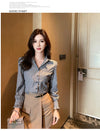 Chic striped blouse for office elegance, featuring a turn-down collar and single-breasted closure, perfect for professional w