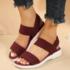 Breathable knit wedge sandals with secure back strap and flattering low heel height