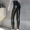 Flat lay of chic high-waist faux leather leggings, showcasing premium material and versatile design.