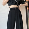High-waisted polyester trousers with elongating wide leg style for sophisticated look