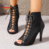 Modern ankle boots with lace-up front and hollow-out cutouts for dancers and performers