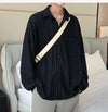 Men's Hollow Out Mesh Long-Sleeve Shirt in black and apricot, featuring breathable fabric and tailored fit for stylish comfor