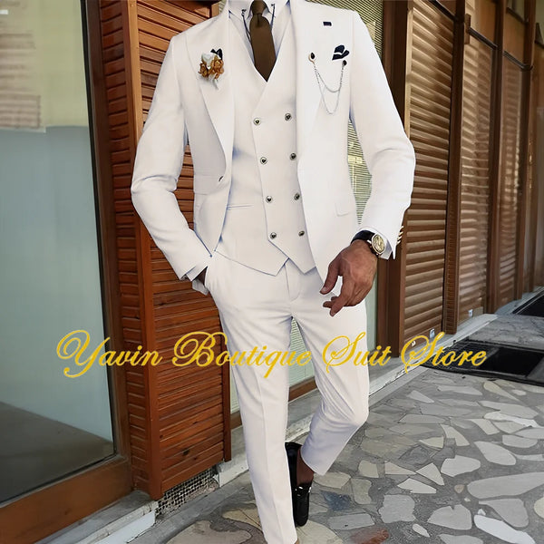 Elegant wedding suit paired with a classic white shirt and tie.