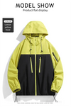 Men's waterproof hiking and urban windbreaker jacket with full-zip closure, oversized fit, and ribbed cuffs for warmth.