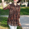 Model wearing the Spring Whispers blouse, highlighting its loose fit and three-quarter sleeves.