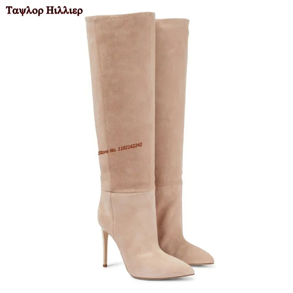 Sophisticated knee-high stiletto boots for evening wear.