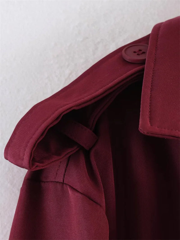 Structured short trench coat with double-breasted and belt details
