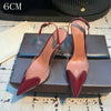 See-through high heels with pointed toe and adjustable closure