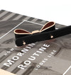 Elegant women's belt with bow detail in faux leather, perfect for casual and formal outfits, featuring a sleek metal buckle.