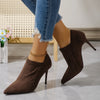 Stylish cream pointed toe pumps with a thin heel, ideal for autumn fashion.