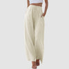 Adjustable strap pants in breathable cotton-linen blend showing flowing wide-leg silhouette