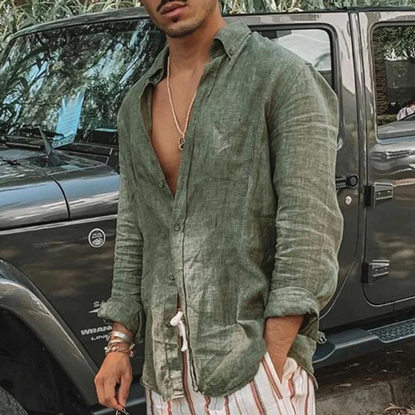 Lightweight linen broadcloth shirt featuring generous oversized fit and timeless turn-down collar design