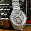 Flat lay of the Timepiece of Triumph with focus on its intricate skeleton dial design.