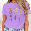 Floral print women's tee featuring 'Faith Hope Love' message, perfect for casual wear and versatile styling options.