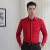 Blue wrinkle-resistant dress shirt featuring French cuffs and coordinating cufflinks for formal occasions